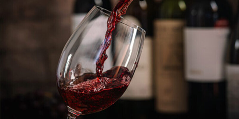 pouring-red-wine-into-glass pouring-red-wine-into-glass