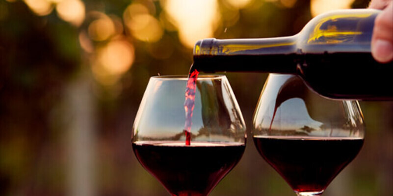 pouring-red-wine-autumn